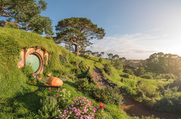 A hobbit hole on the side of a hill