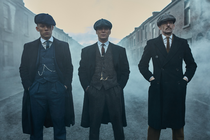 Actors from Peaky Blinders on street