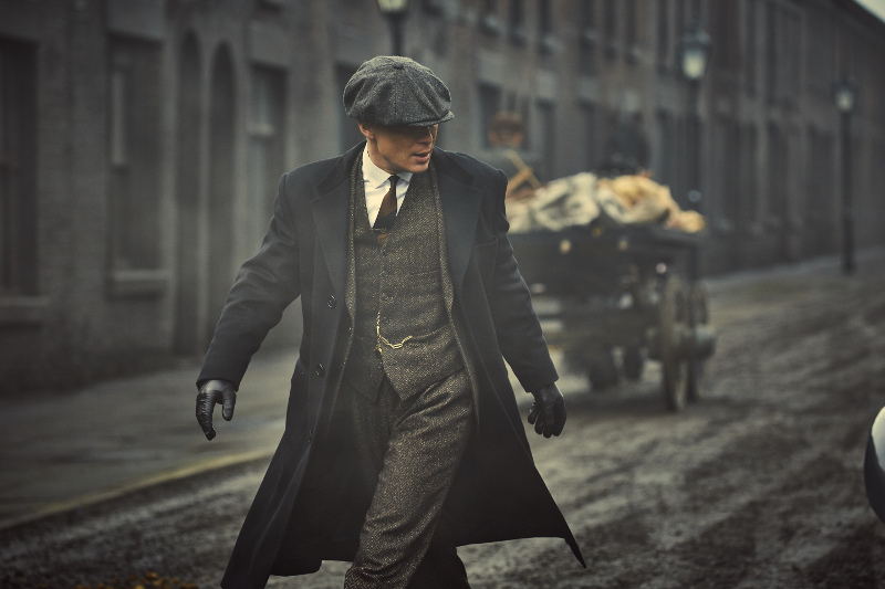 Cillian Murphy as Tommy Shelby on street