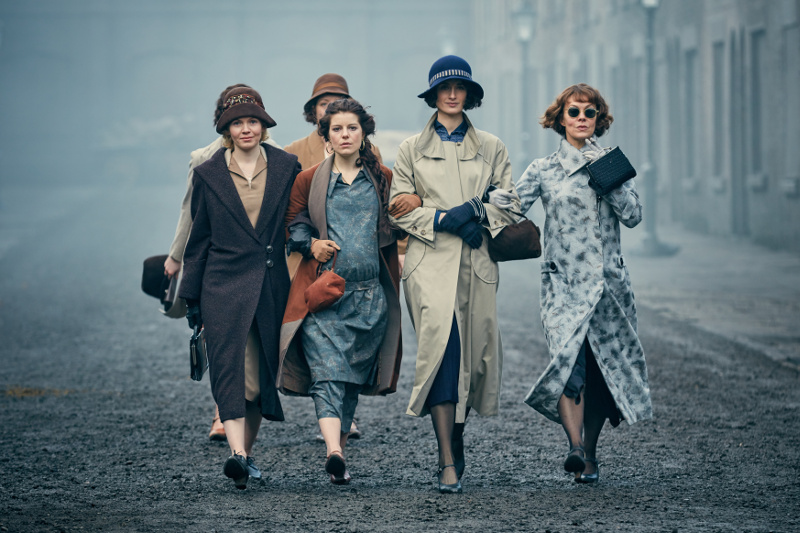 Women in character on 1920s street of Birmingham