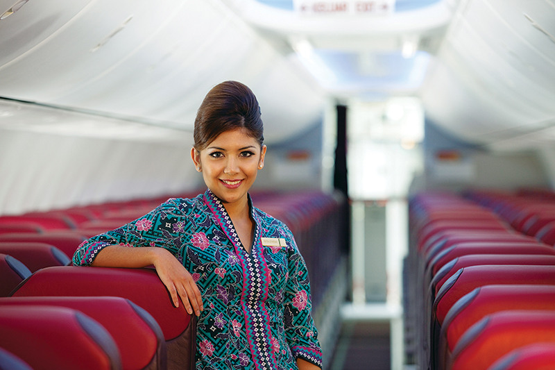 A Malaysia Airlines crew member inside the cabin.