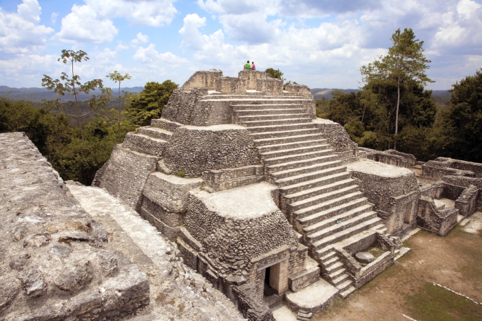 Mayan ruin Caracol rises above the jungle in Cayo District, Belize - cruise trends to try
