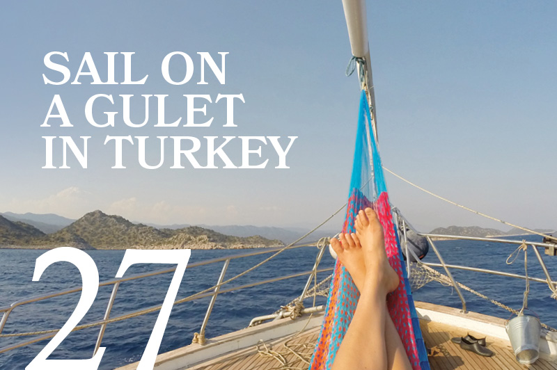 feet up in a hammock on a sail boat