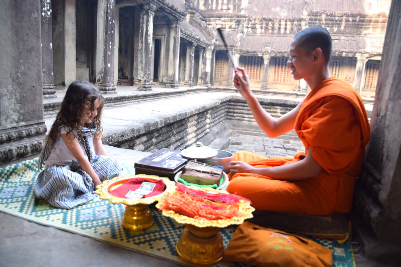 Buddhist blessing at Angkor Wat.