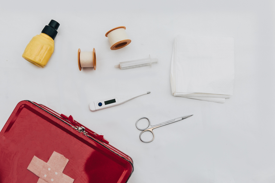 how to avoid getting sick while travelling - first aid kit
