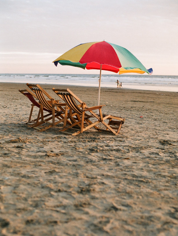 beach chairs on beach in ecuador