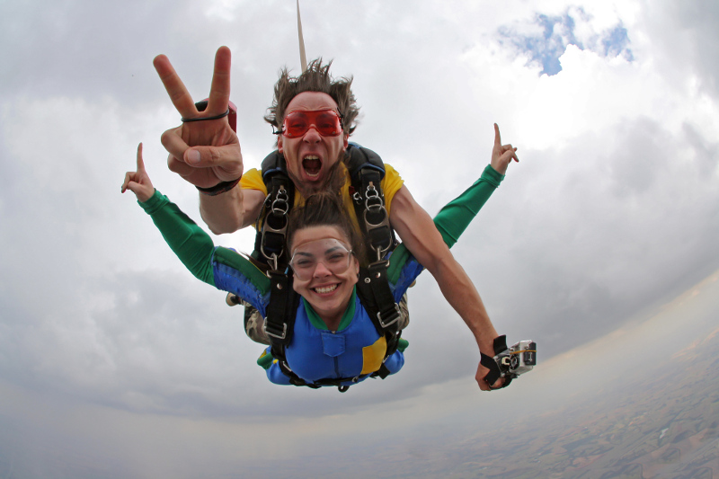 Couple tandem sky diving