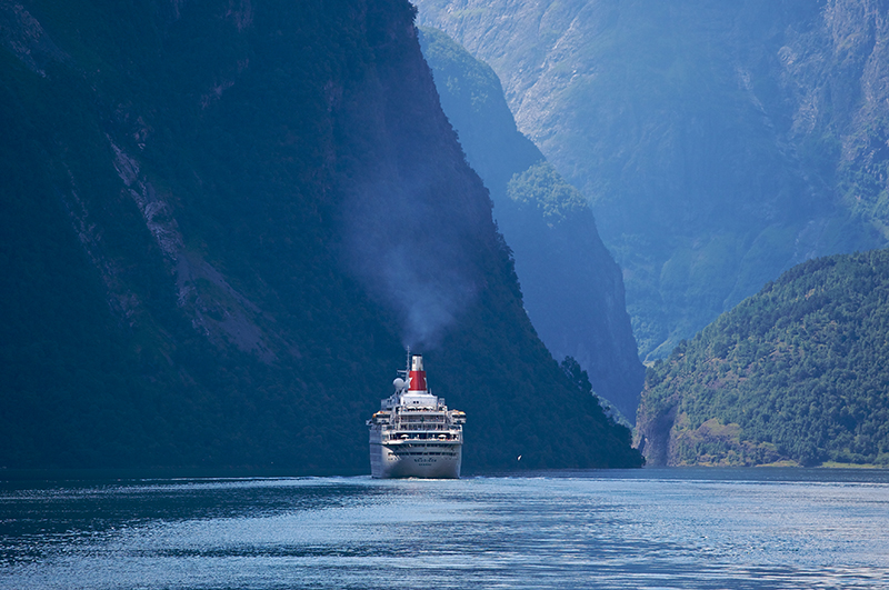 mid size ship in fjord in norway