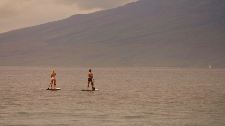 Greer and Jason paddle boarding at the Hyatt Regency Maui Resort & Spa during The 48 Hour Destination: Hawaii. 