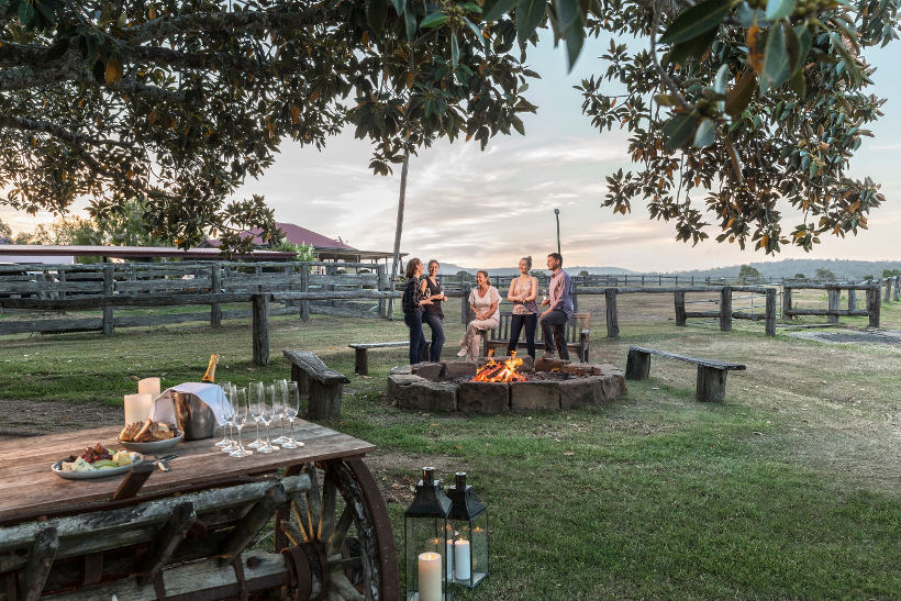 group standing by fire pit at spicers hidden vale