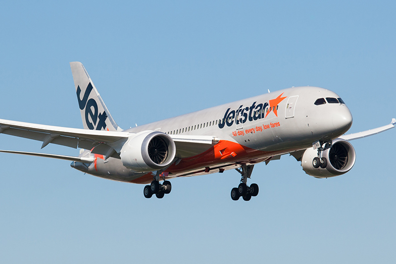 Jetstar 787 Dreamliner plane in the air