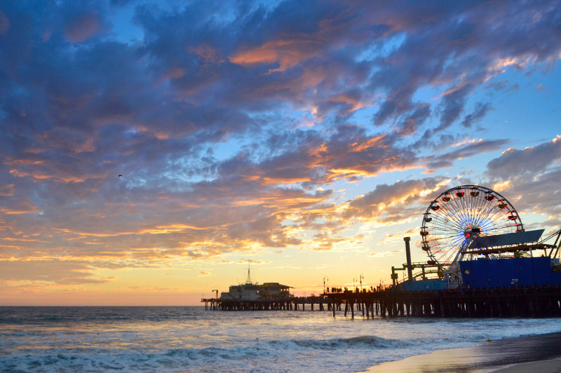 The pier and ferris wheel at Santa Monica Beach, Los Angeles.