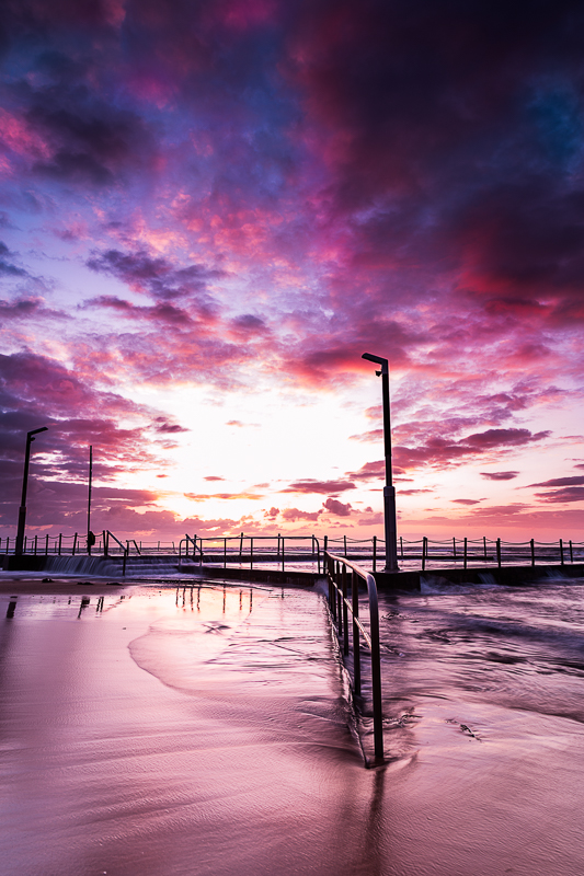 mona vale pool with beach in foreground 