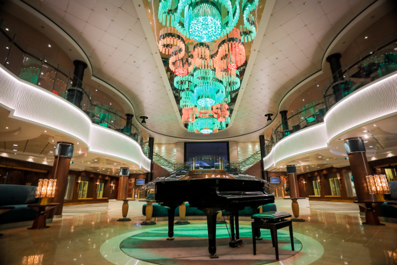 A grand piano graces the revamped atrium on board the Norwegian Jade cruise ship.