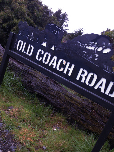 A photo of the Old Coach Road sign