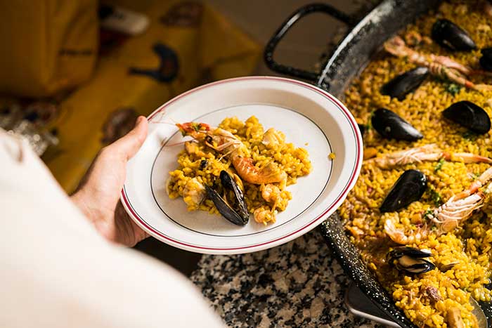 paella is a staple dish in Spain