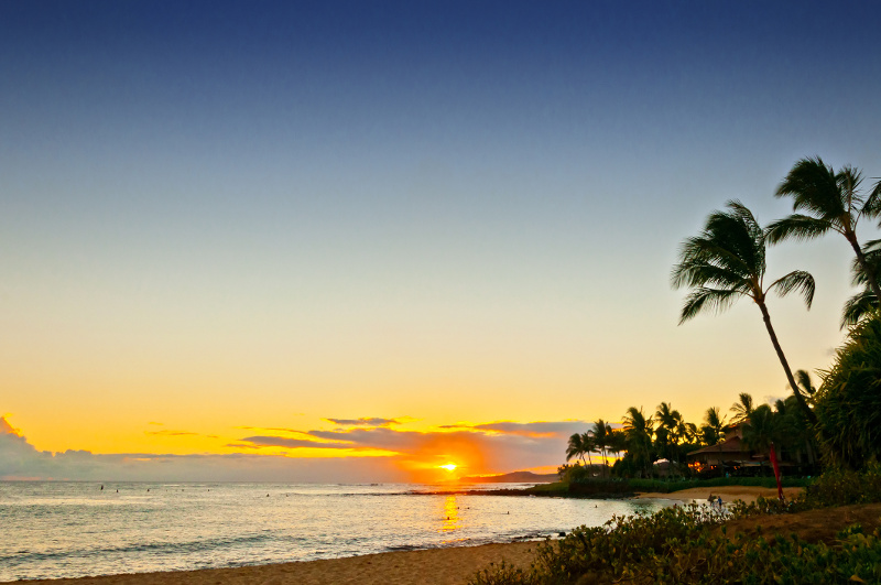 a view of the shoreline along Poipu Beach