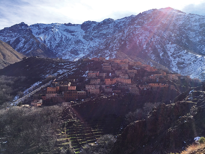 The High Atlas range dwarfs a Berber village