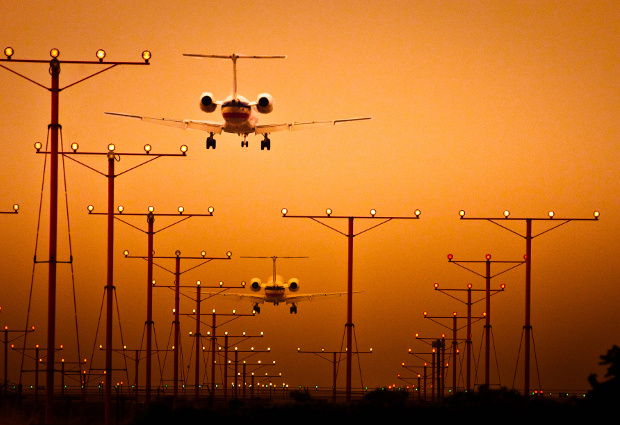 Planes arriving at LAX at sunset