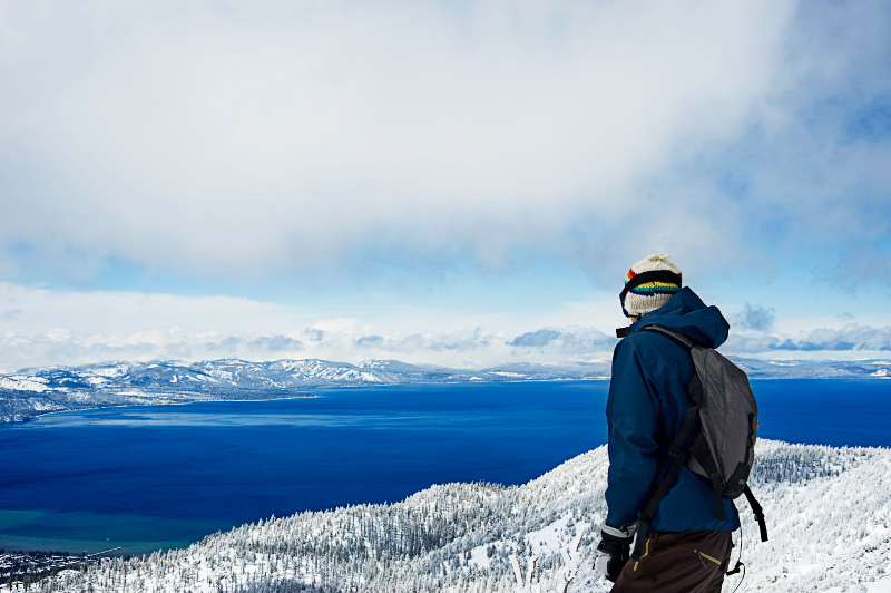 Skier overlooking Lake Tahoe, California