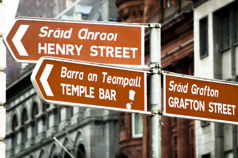 street sign in Dublin, Ireland, in English and Gaelic