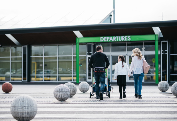 family entering Hobart Airport