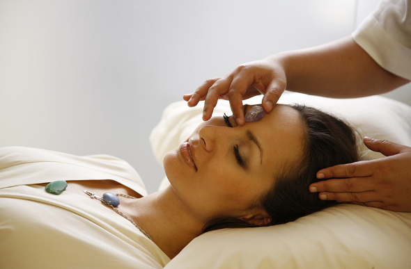 A woman receiving a spa treatment at Abu Dhabi Airport.