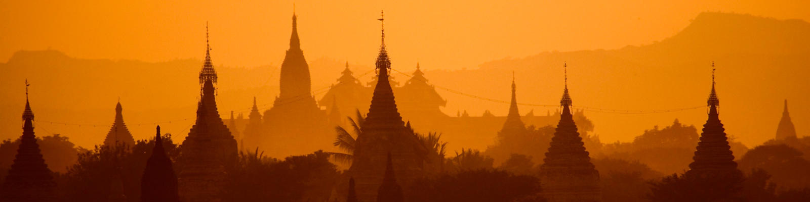 A golden sunset over the temples of Bagan in Myanmar.