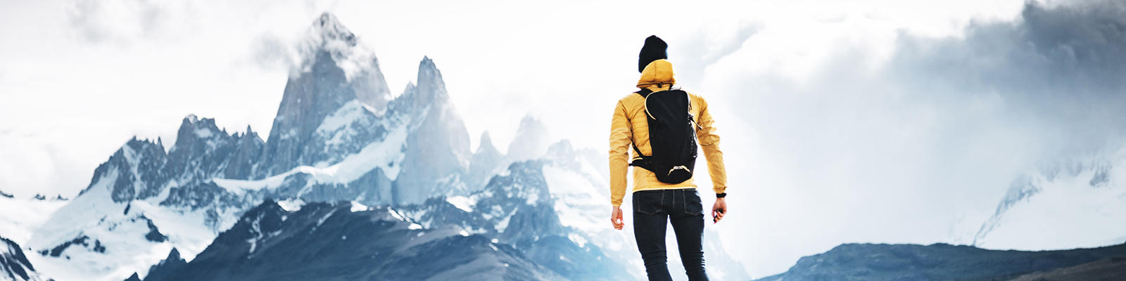A hiker looks at the looming El Chatan Peak in Patagonia