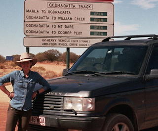 Writer Sam Aldenton at the start of the Oodnadatta Track just outside of Marla on her outback road trip.