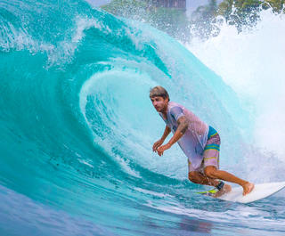 Bali surfer on waves.