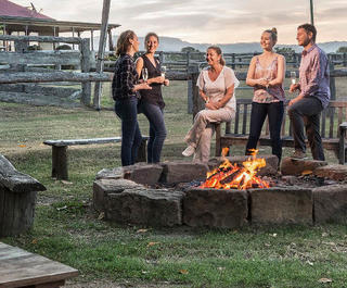 group around fire pit spicers hidden vale