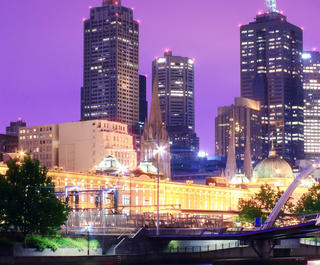 A view of Melbourne over the river at night