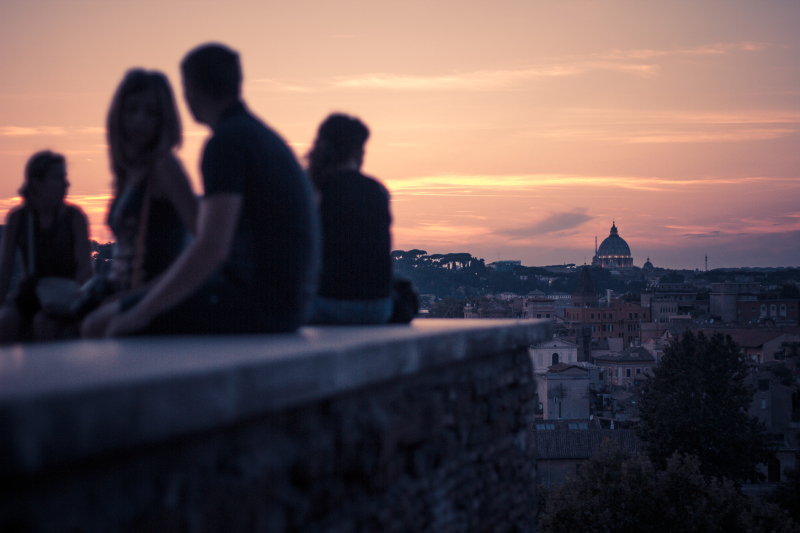 Group watching sunset in Rome.