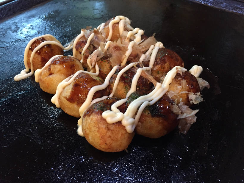 takoyaki balls on the hot plate