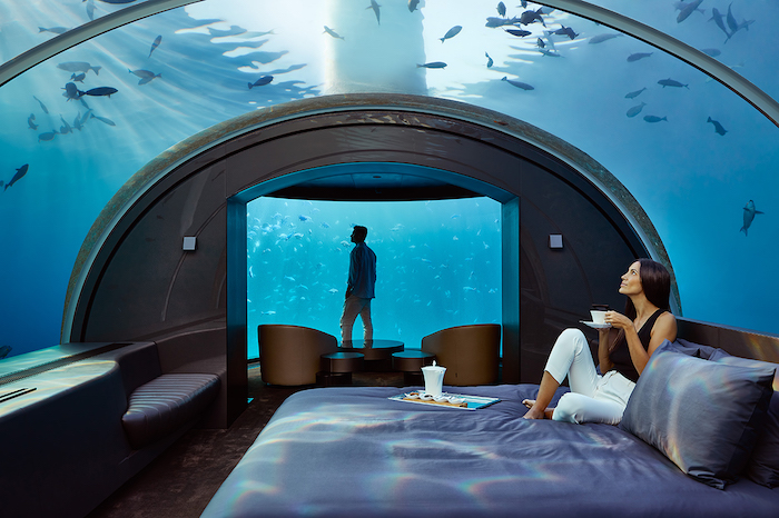 a couple stays in the muraka's underwaters suite - romantic travel experiences for valentines day