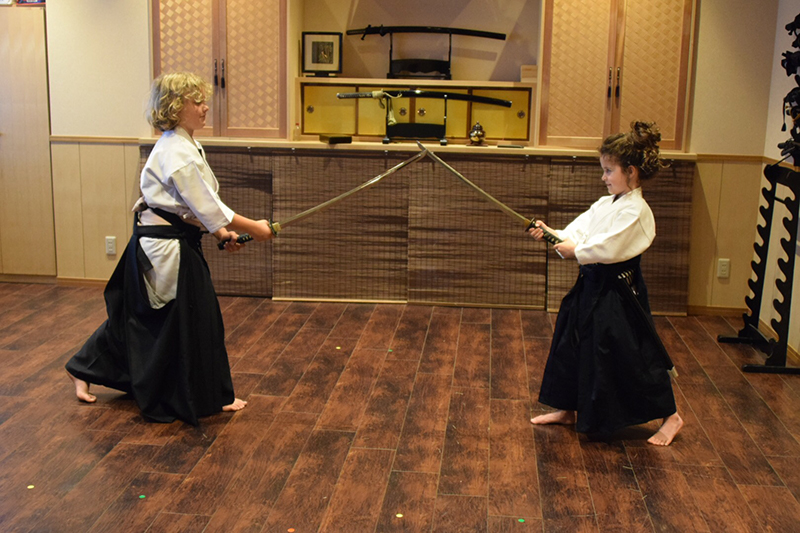 Kids doing samurai training in Tokyo